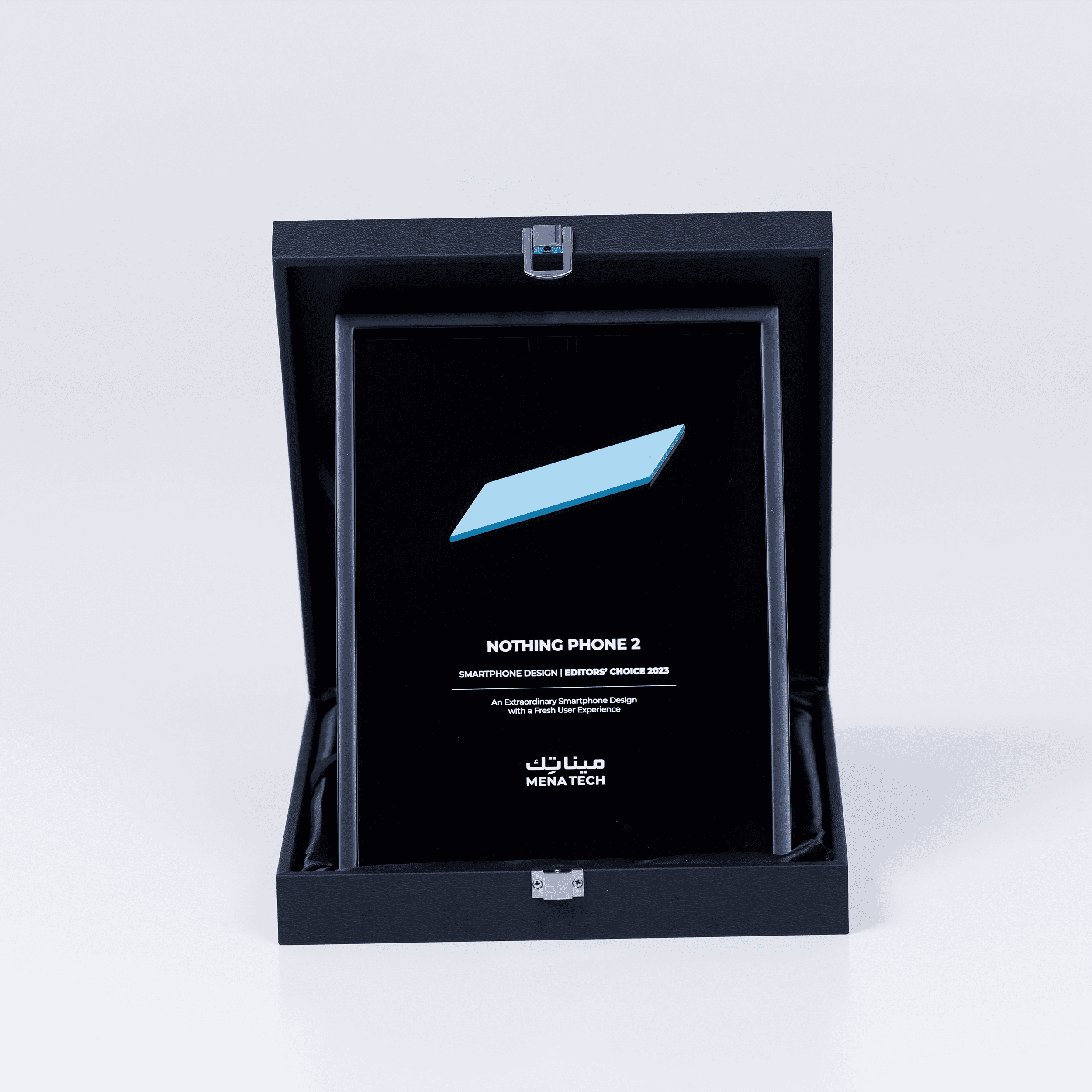 A close-up of the MENA Tech Editors' Choice 2023 award plaque for Nothing Phone 2, recognizing its outstanding smartphone design.